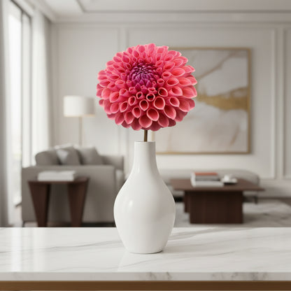 Close-up of Jowey Winnie ball-shaped dahlia showing rounded petals and warm rose coloring, ideal for cutting gardens.